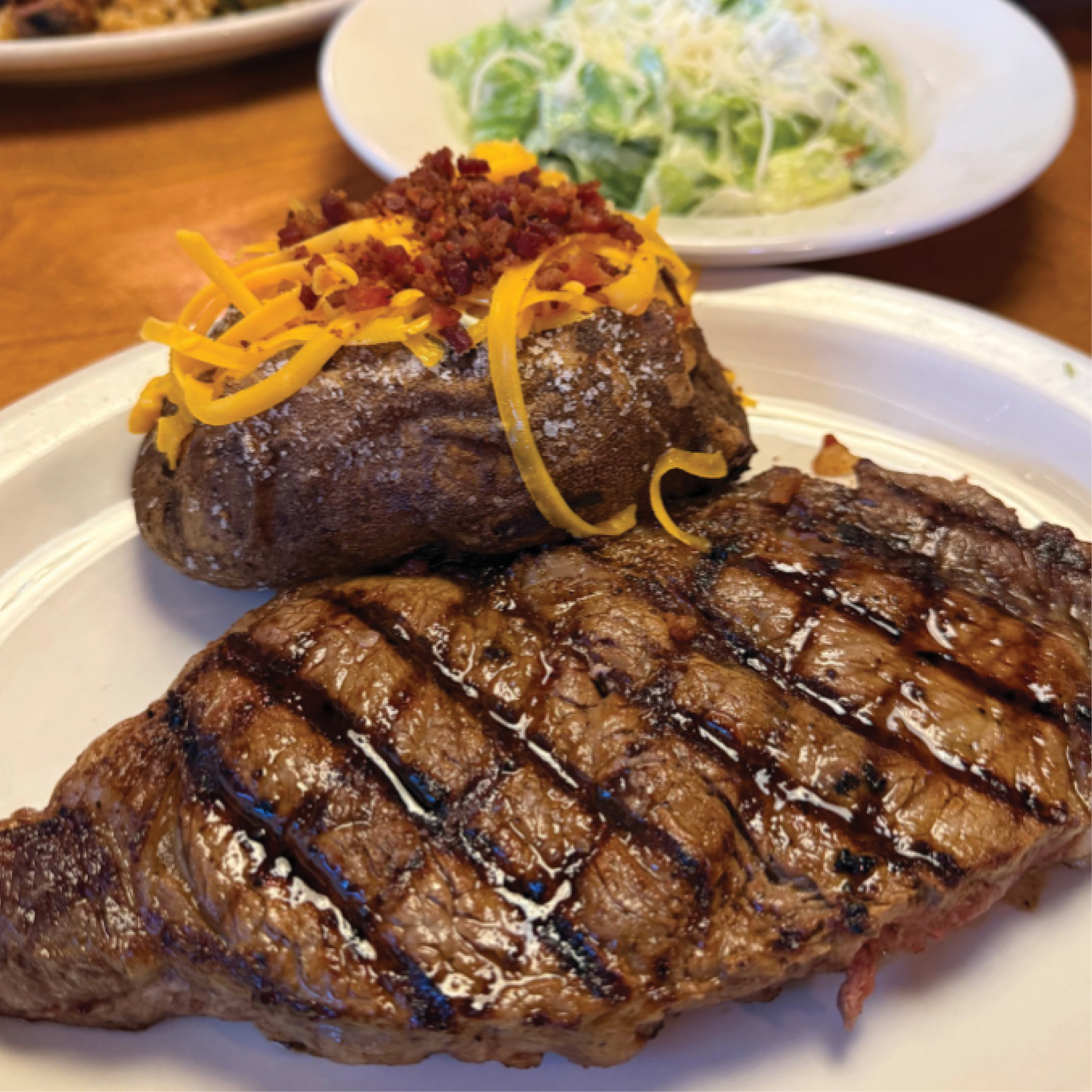 Image of Texas Roadhouse steak and loaded baked potato